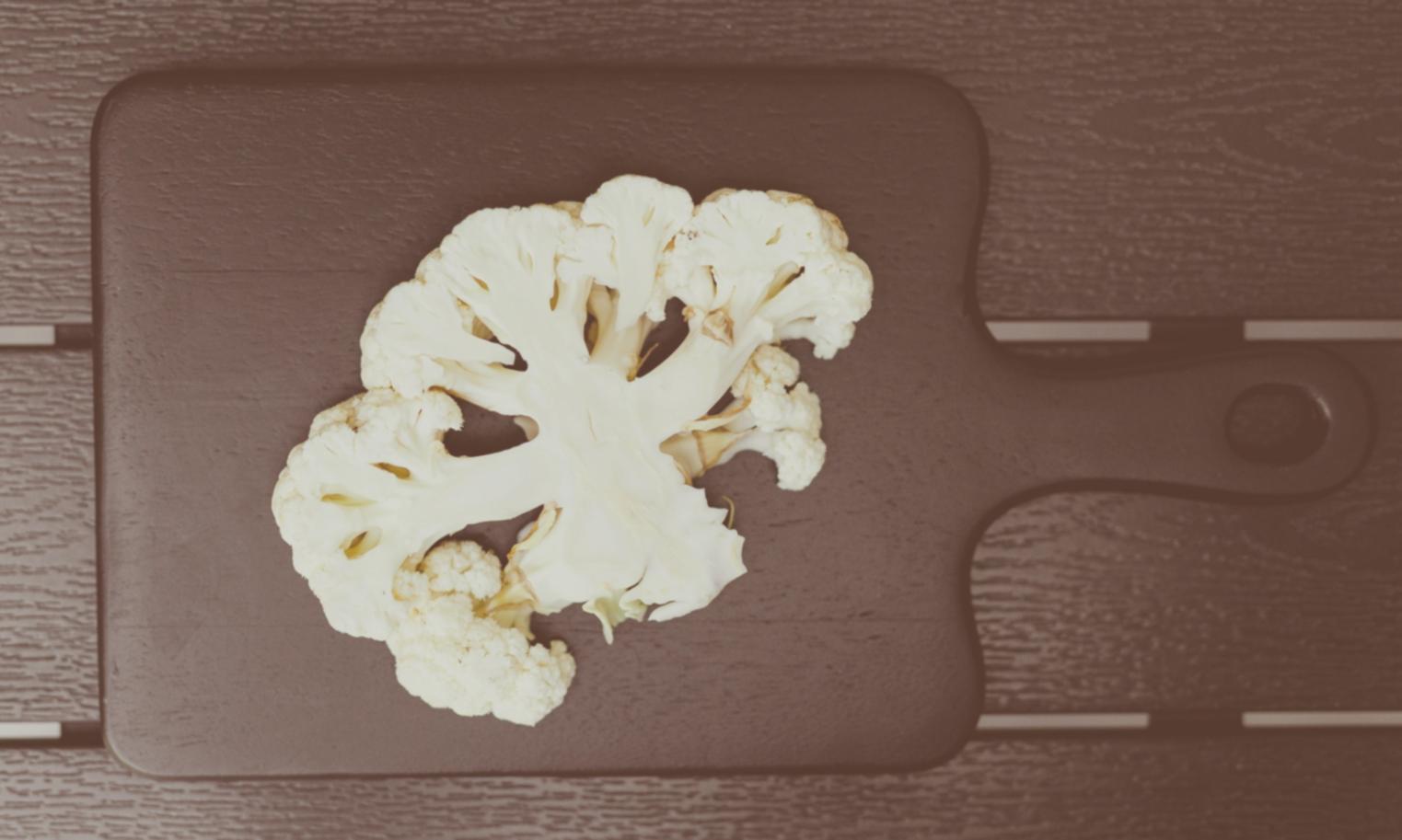 Professional kitchen workspace with organized ingredients and tools