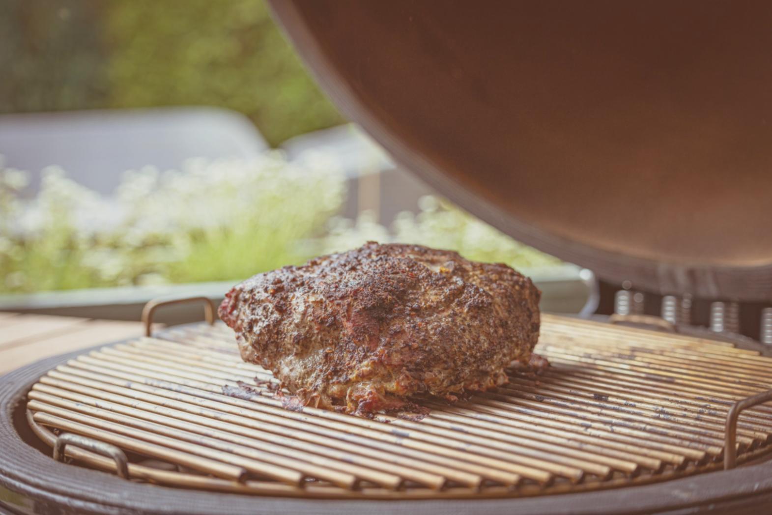 Professional kitchen training session with chef demonstrating plating technique